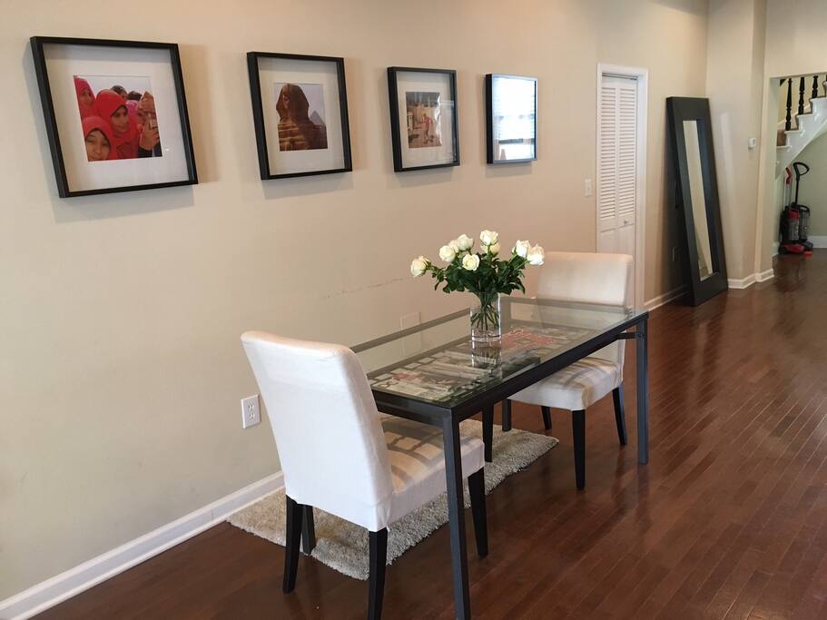 The table and dining area. When I'm home I often accent the dining area with fresh roses from one of the 3 grocery stores within walking distance.