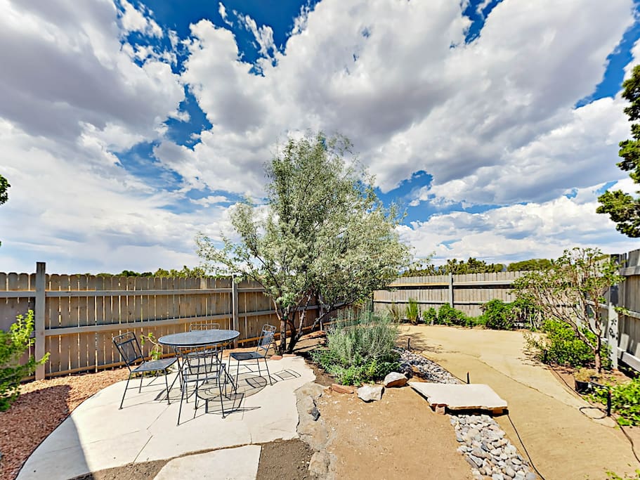 A large private yard offers a great spot to enjoy the blue skies and fantastic weather.