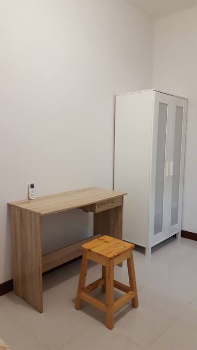 A desk and a cupboard