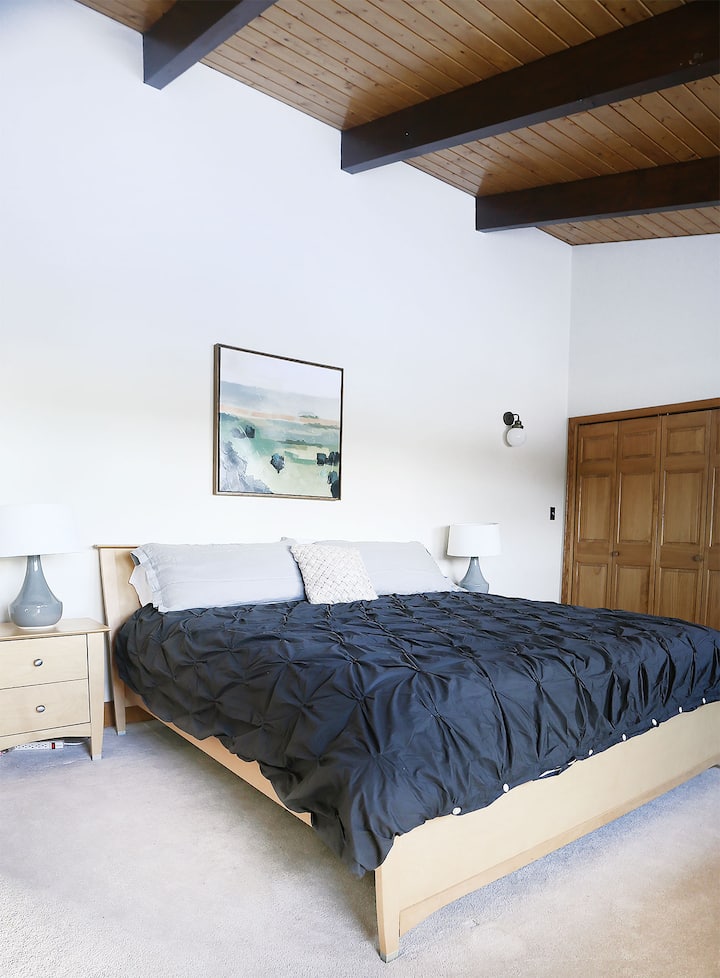 Bedroom 1: primary with ensuite, king bed, smart tv,  mountain views