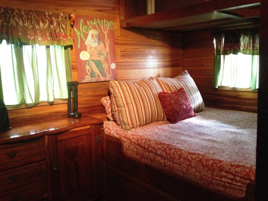 A Captains Quarters master room with Queen Bed offers certain comfort with a nautical style. Let the gentle harbor waters rock you to a peaceful sleep.
