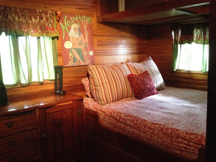 A Captains Quarters master room with Queen Bed offers certain comfort with a nautical style. Let the gentle harbor waters rock you to a peaceful sleep.