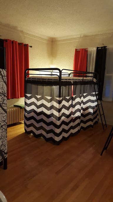 Bedroom #2 - Bunk beds with privacy screen on bottom beds