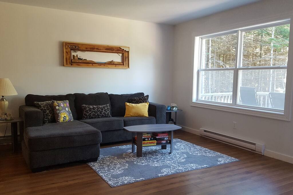 Sunny, comfortable living room, with lots of boardgames and puzzles and books to read.