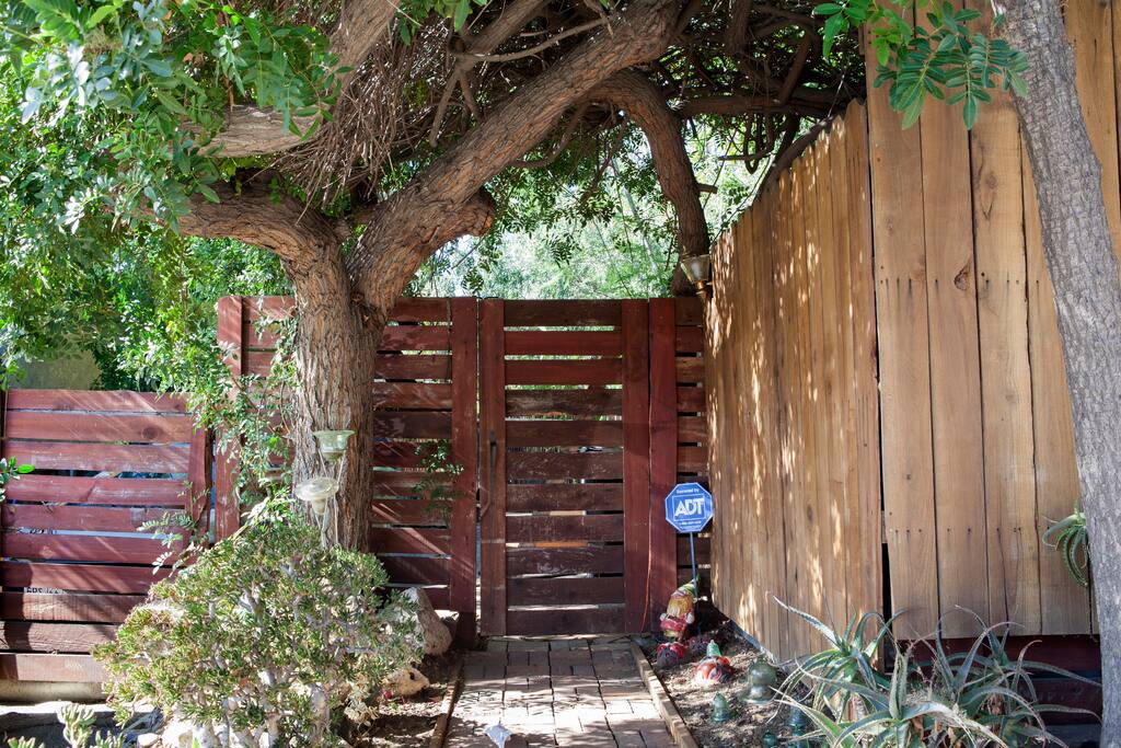 Curbside view of the front gate that will lead you to the Upper Landing/shared area of your destination.