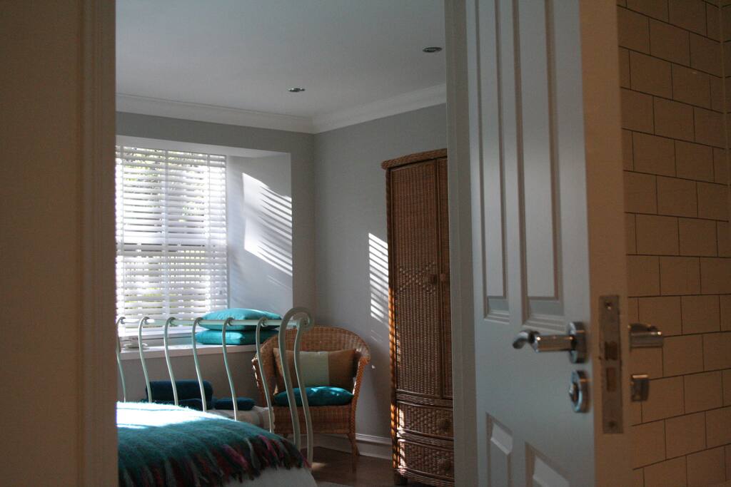 Looking into the bedroom from the en-suite bathroom