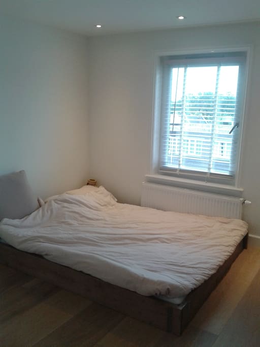 Comfy bed with high quality mattresses. Entrance bathroom on the right.