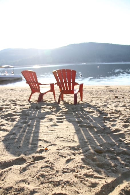 Adirondack chairs on our private beach