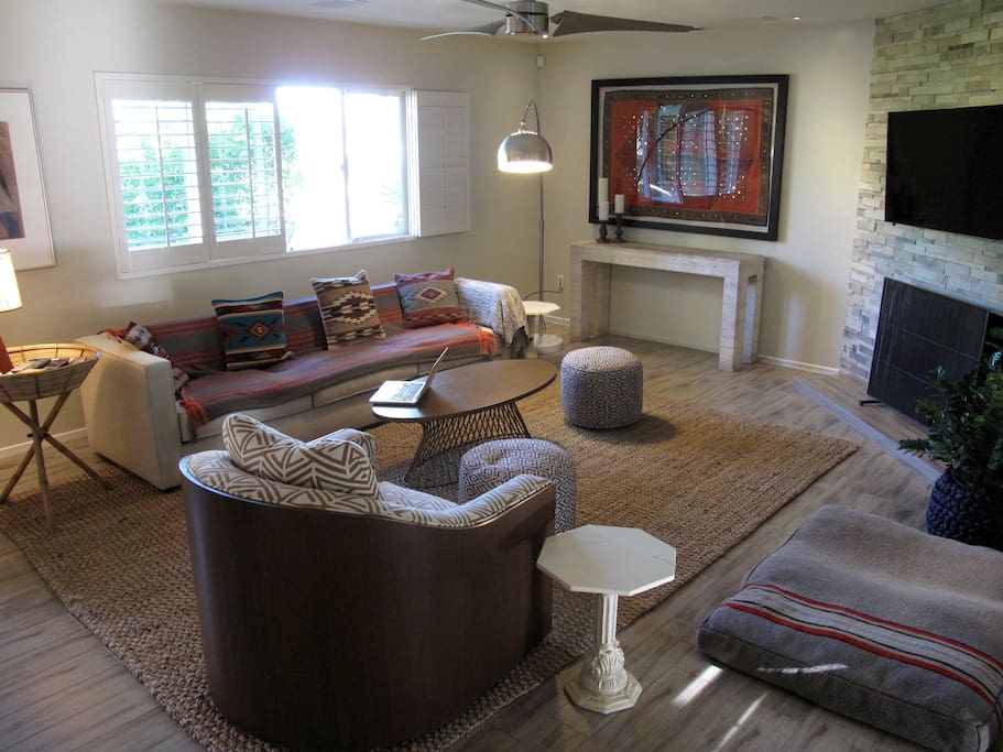 Comfortable living room seating for enjoying the home theater with surround sound.