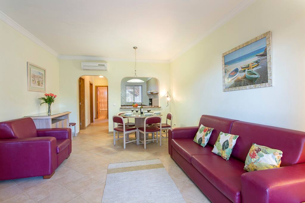 Spacious open plan living & dining room leading out onto sunny terrace