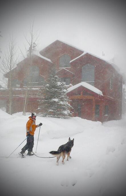 front of house during snow storm