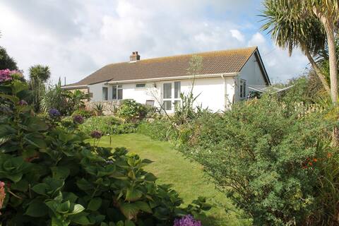 Rural with sea views, large garden, sleeps 6