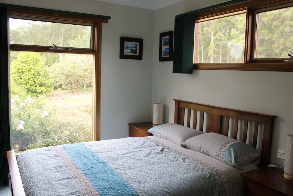 The double room looks out over the NE garden, through the trees to Bass Strait