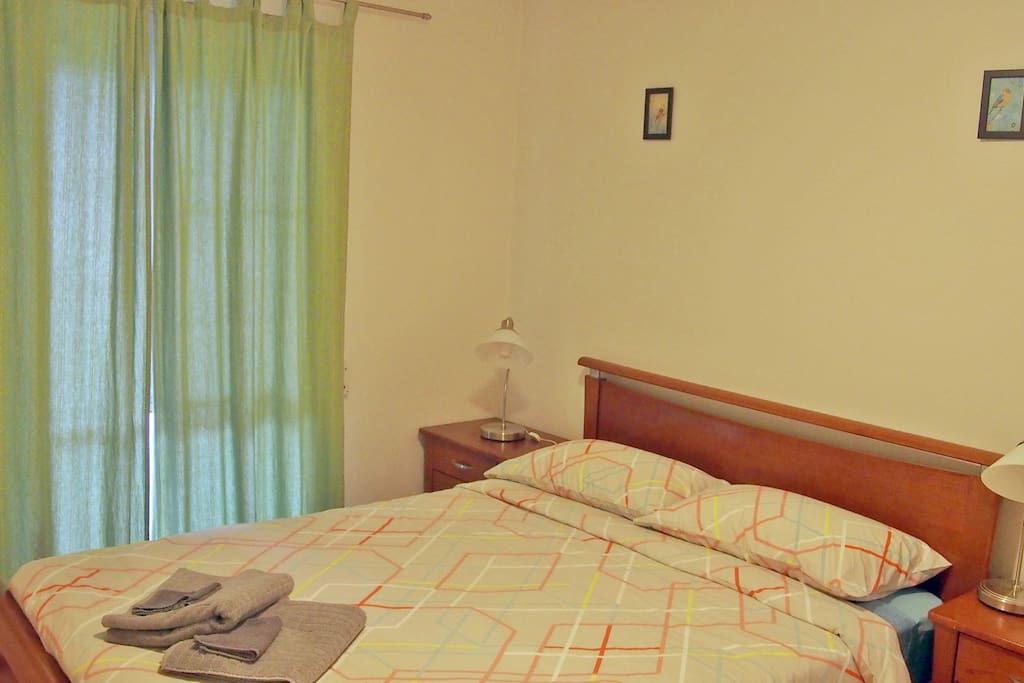 Bedroom 1. is large with queen sized bed, bedside tables and built-in robe
