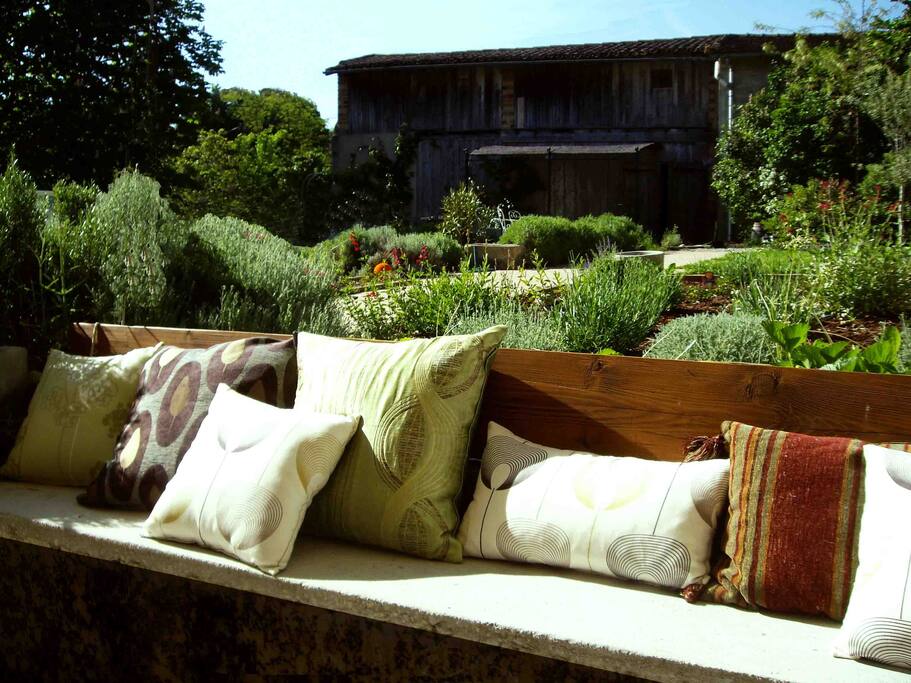 Plenty of outside seating, we provide you with furniture and cushions.