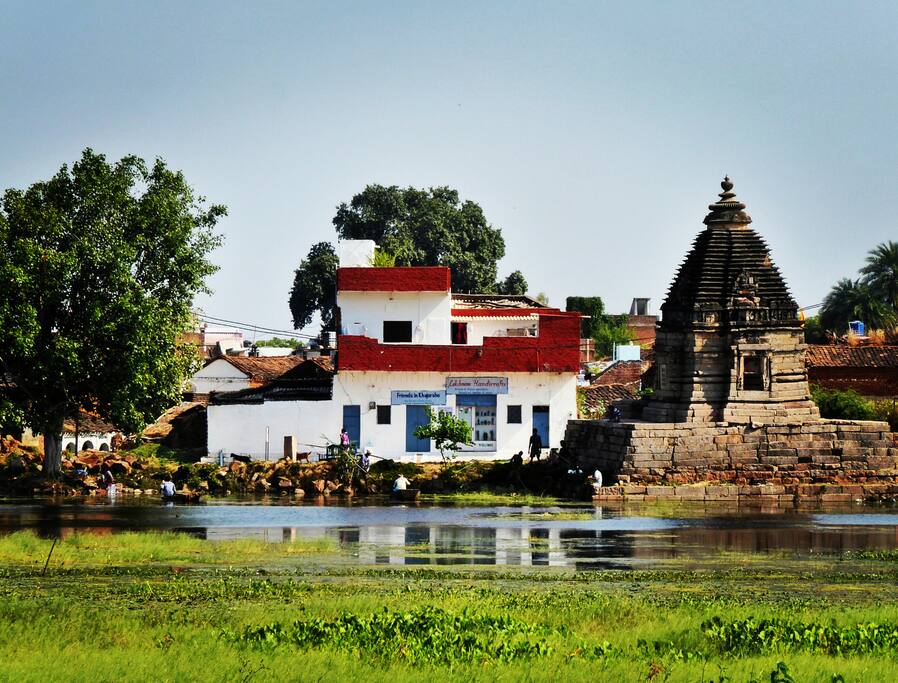 Our house viewed from the other side of the lake! Photo by Anna Phipps