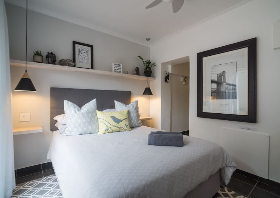 Bedroom with kitchenette entrance on side