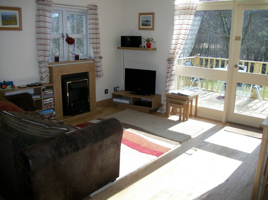 from kitchen to living area and deck outside