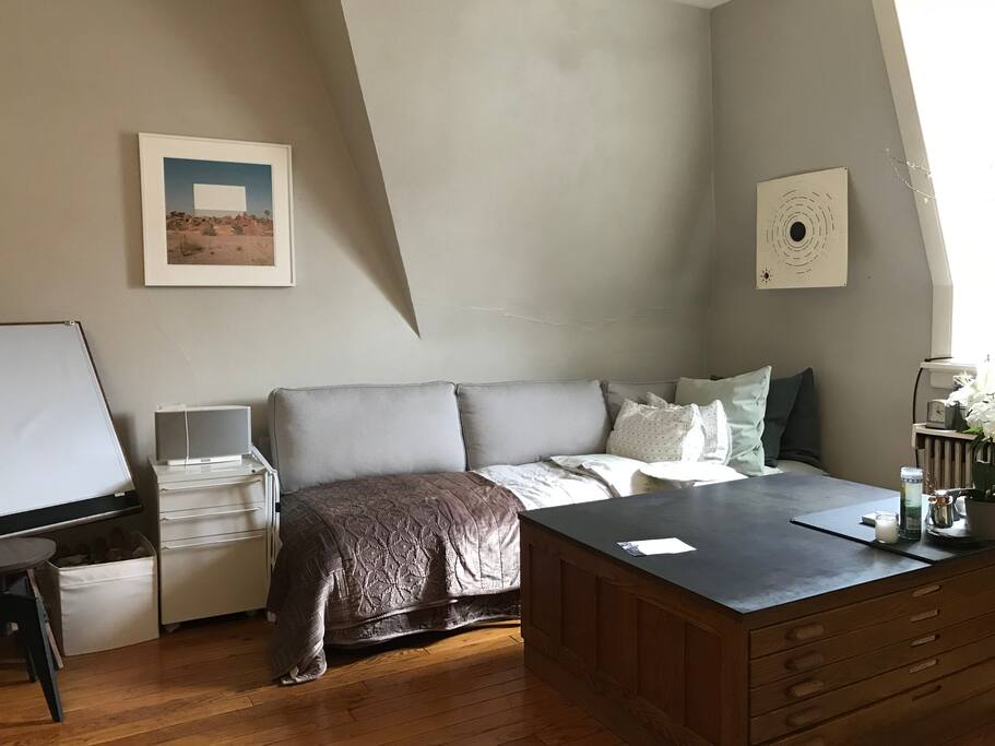 sofa set up as a bed for separate sleeping location
