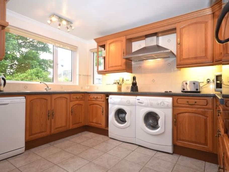 Kitchen including dishwasher,washing machine,tumble dryer,double oven, microwave, fridge and freezer