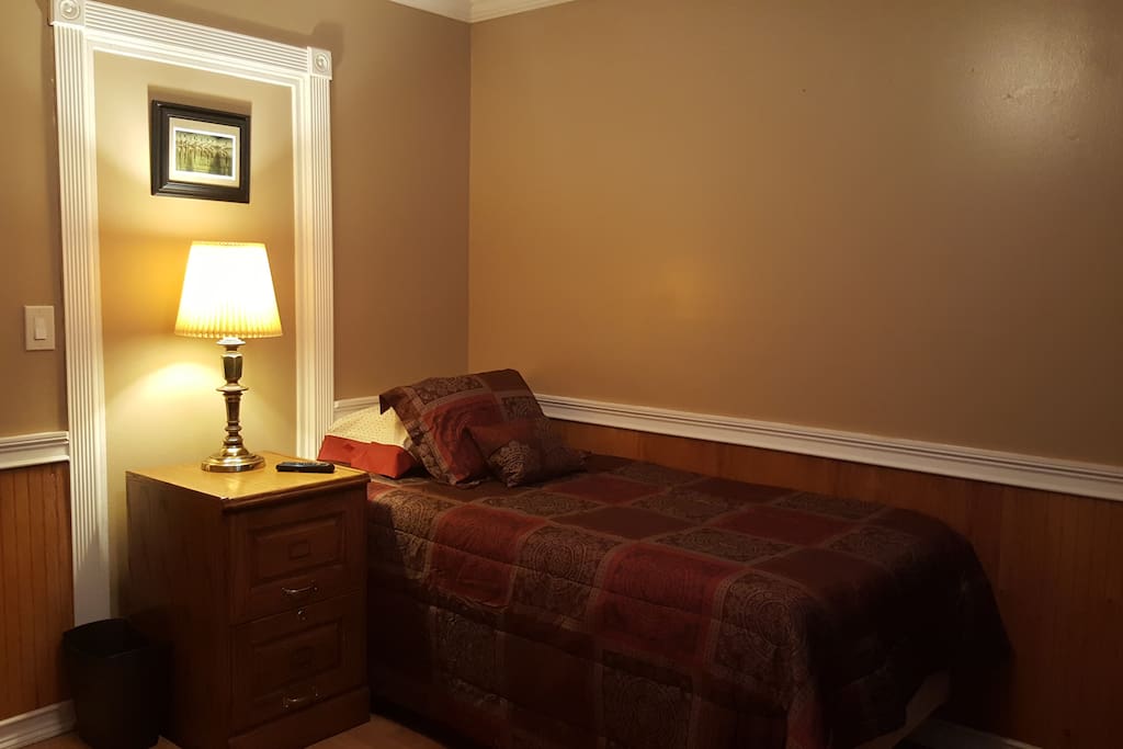 The private room has a Twin-XL bed with a pillow top mattress.