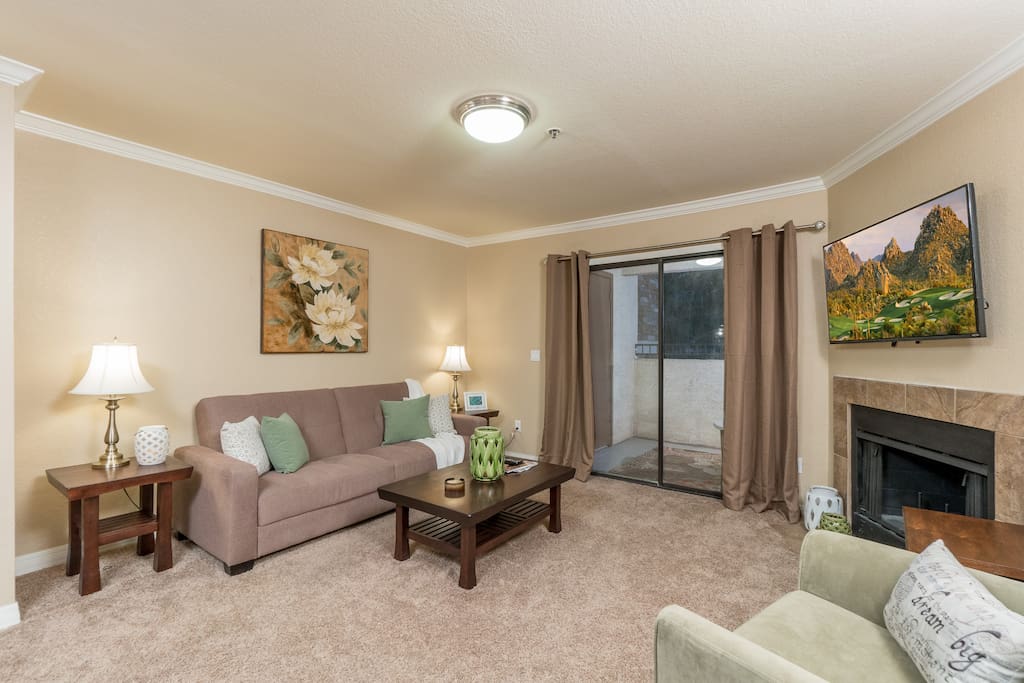 Living room opens out to the balcony.