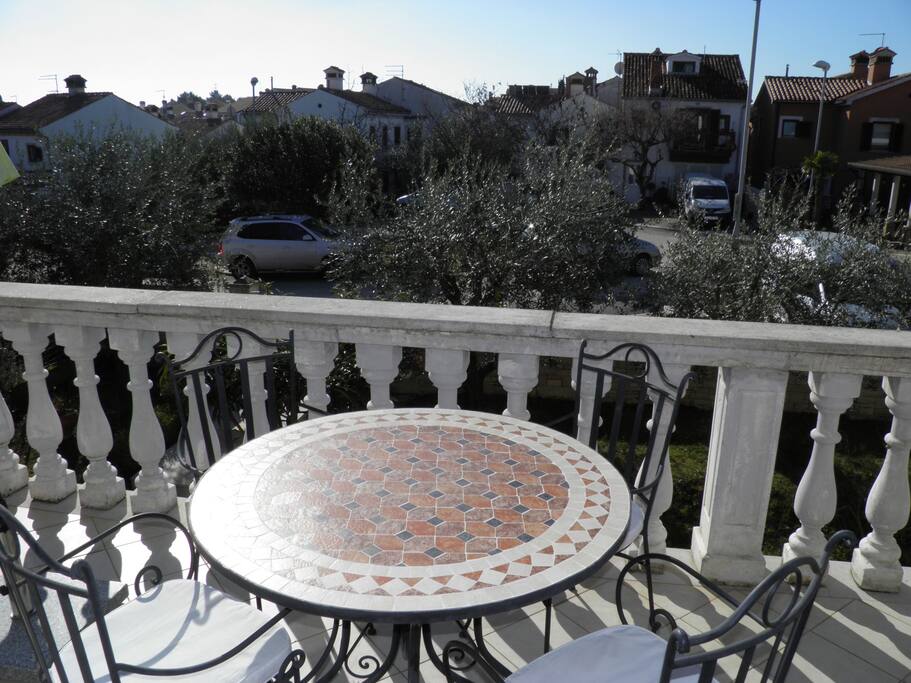 Nice sunny terrace with umbrella