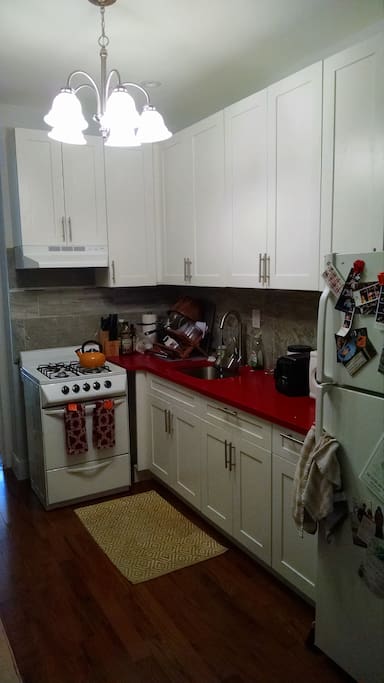 Kitchen does not have a dishwasher, but does have full size fridge/freezer, oven/stove, microwave, and toaster.