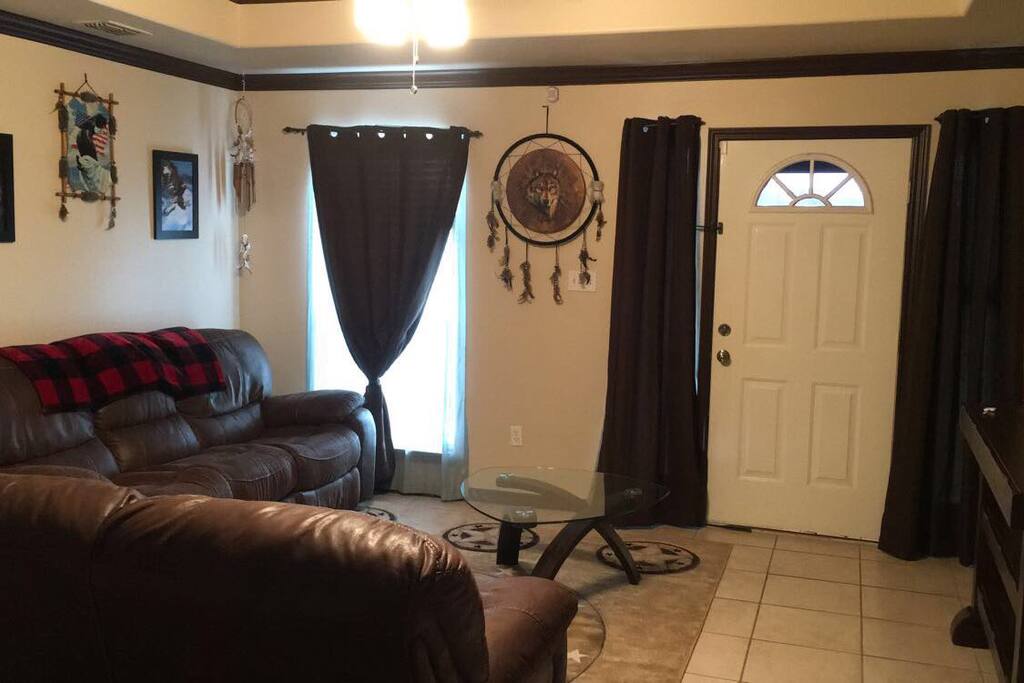 The living room and front door