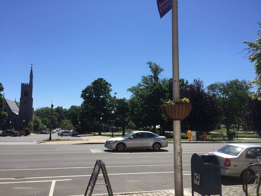 This is the street level view from the front of our building. You can see the first part of the Amherst green is across the street on the right.