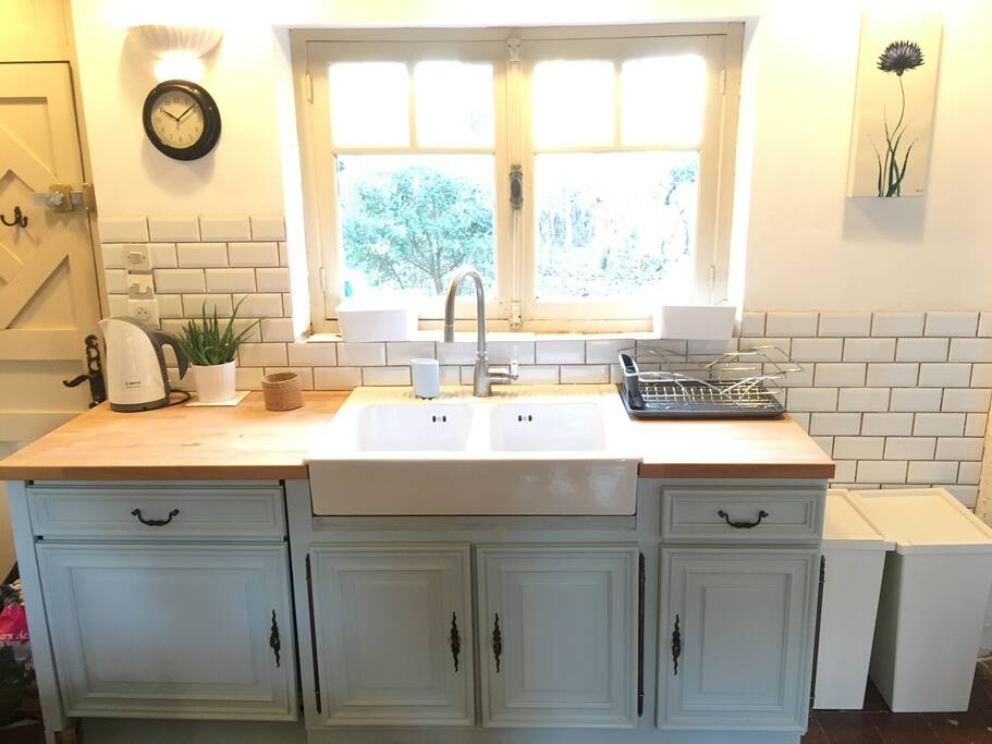 Well equipped kitchen/dining room with access to rear garden and al fresco dining.