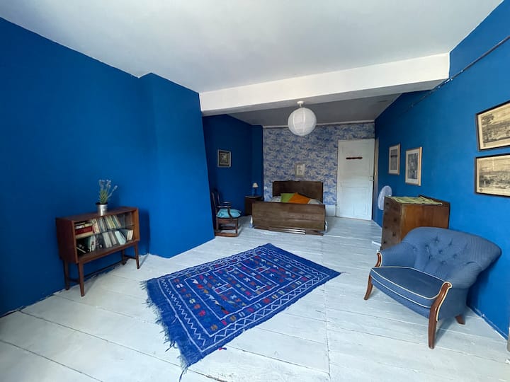 Room 2 features a sleigh bed. All rooms are equipped with a fan.