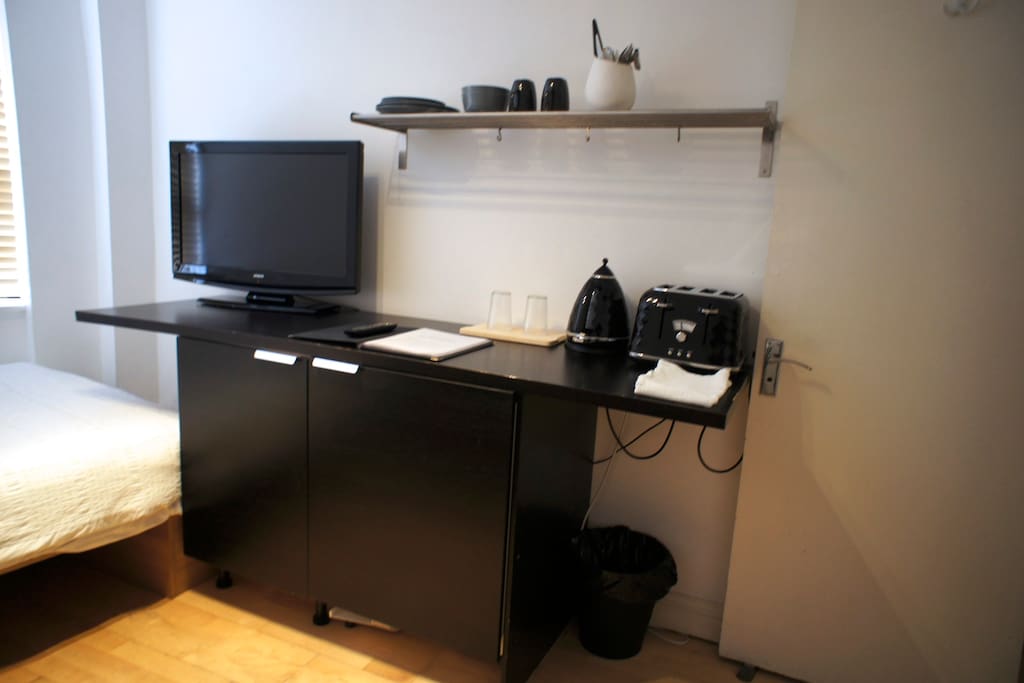 Here's your studio with small kitchenette