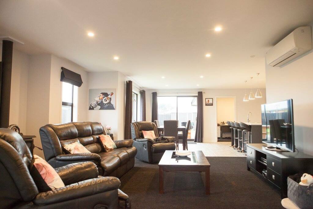 Our main living area (communal) with TV, wifi, air conditioning and log burner