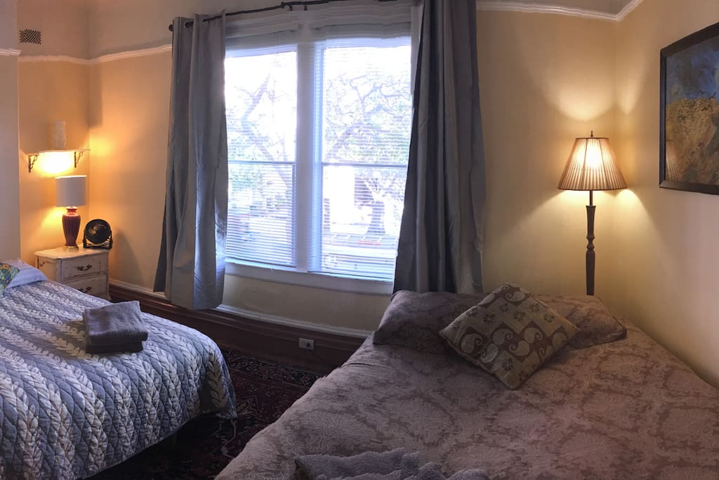 2nd Bedroom with queensize bed and futon couch which converts into full size bed.