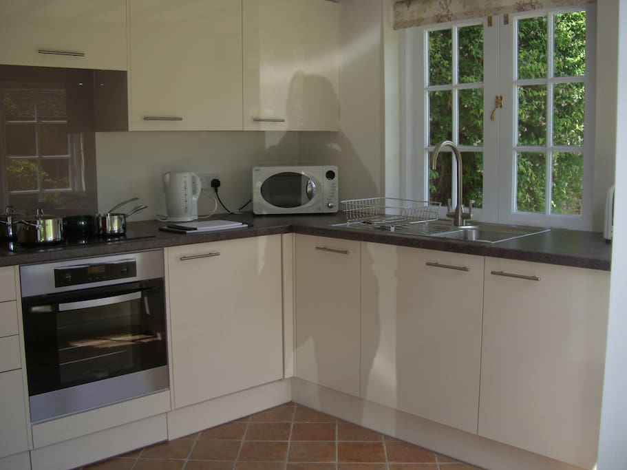 Modern kitchen which does have table and chairs