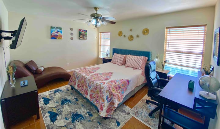 Everything you need in a spacious home with Queen size soft memory mattress in Master’s bedroom with leather chair, lounge chair and computer desk.