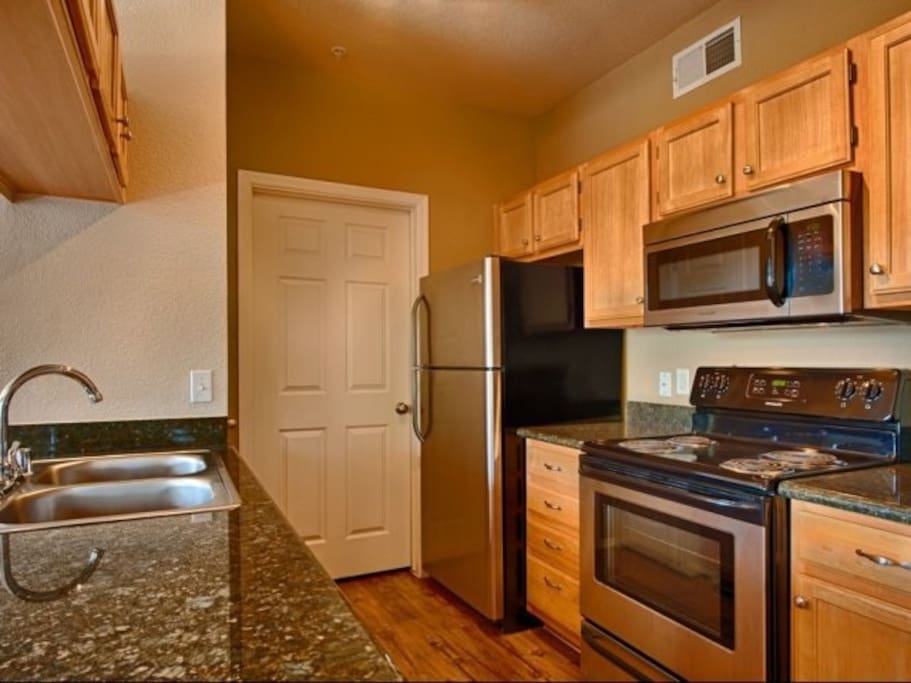 Spacious kitchen with interior laundry