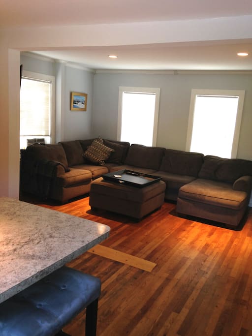 Living room/kitchen. Air conditioning in main area of house.