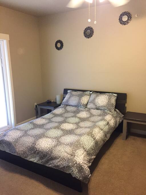 Full size bed - large room could accommodate another adult or child
