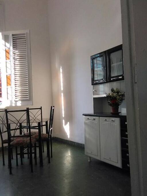 dining area and big window leading towards the street. Lots of ventilation throughout the house.. Lots of light and lots of space