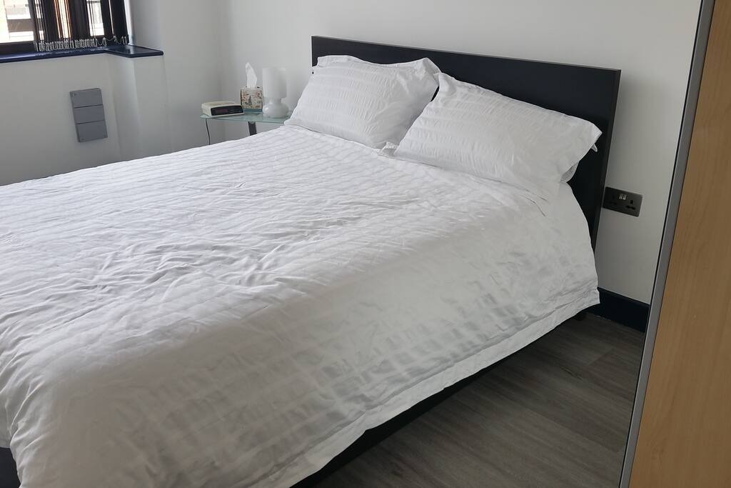 Brand new bed, mirrored wardrobes and new flooring throughout