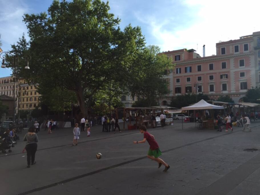 Piazza S. Cosimato - soccer for the kids - wine bars and restaurants for the adults!