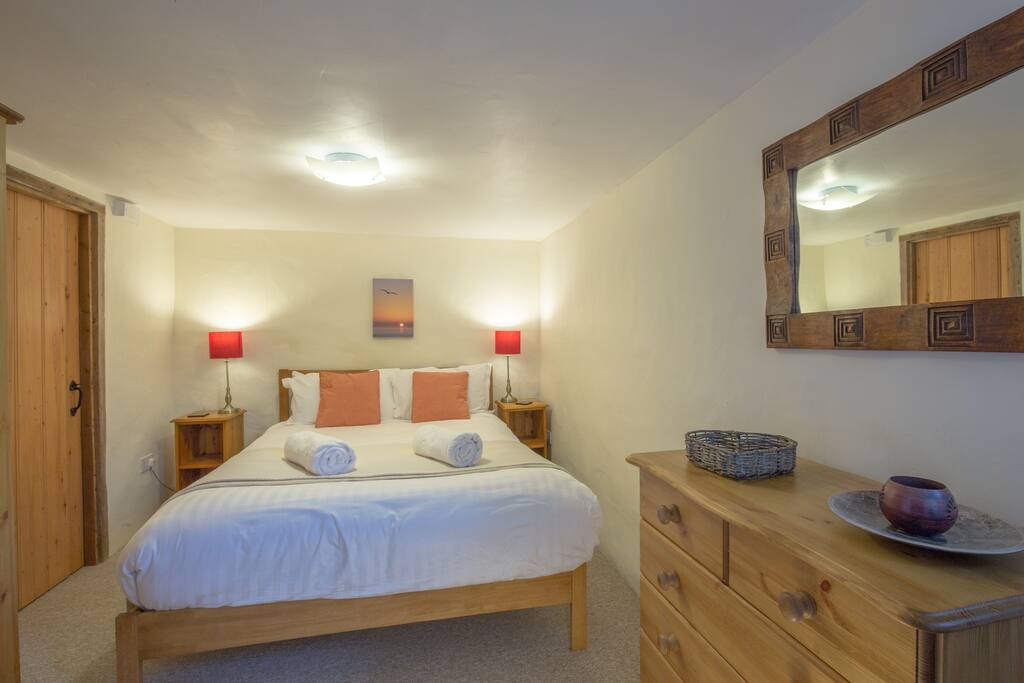 Master bedroom with kingsize bed and ensuite
