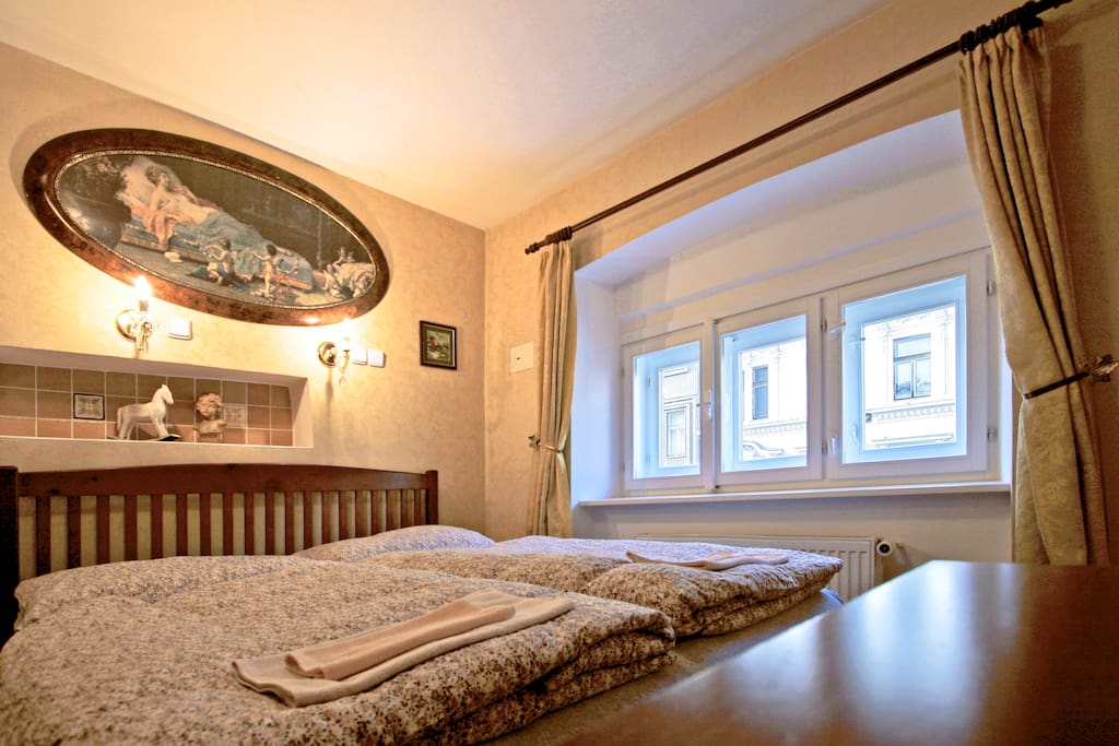 Bedroom with a double bed and a single bed