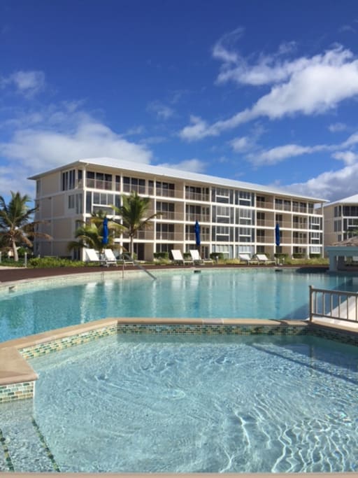beautiful setting with a large pool, private beach and ocean front
