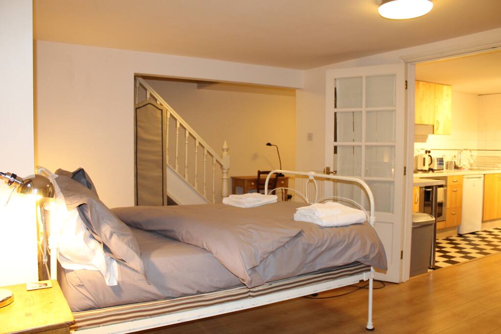 View into the kitchen and office area from the bedroom