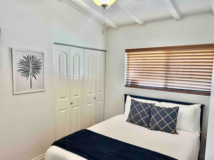 Bedroom 2:  Queen bed + TV (not shown)
