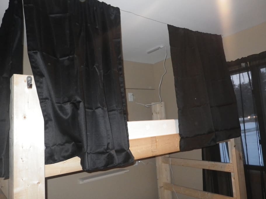 Bunk with black out curtains/ USB ports/ 110 outlets and led lights above bunk area for reading