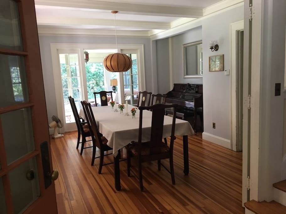 dining room with attached sunroom